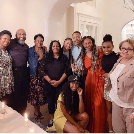 Mike Hill and his ex-wife, Cynthia Bailey, took a picture with Mike's family.